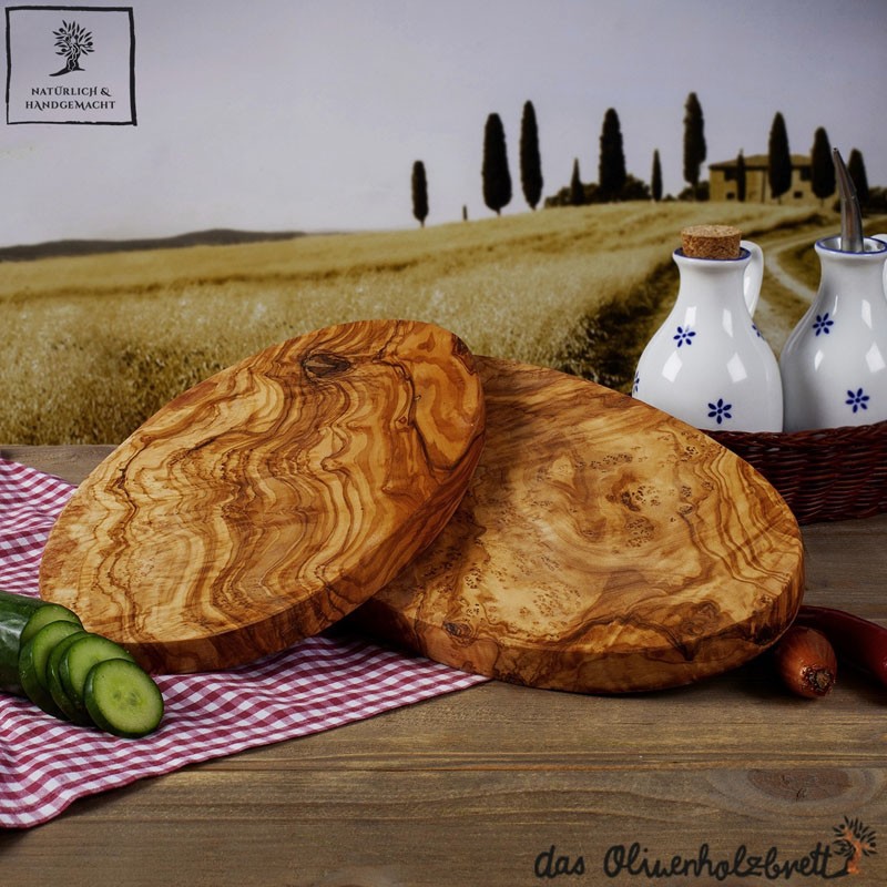 einer Frühstücksbrett mit aus Olivenholz oval, Holzmaserung wunderschönen handgefertigt,