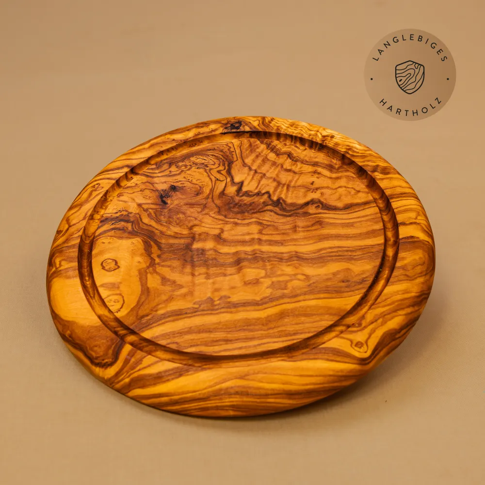 Rundes Schneidebrett aus Olivenholz mit Saftrille | ein Klassiker