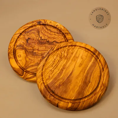 Rundes Schneidebrett aus Olivenholz mit Saftrille | ein Klassiker