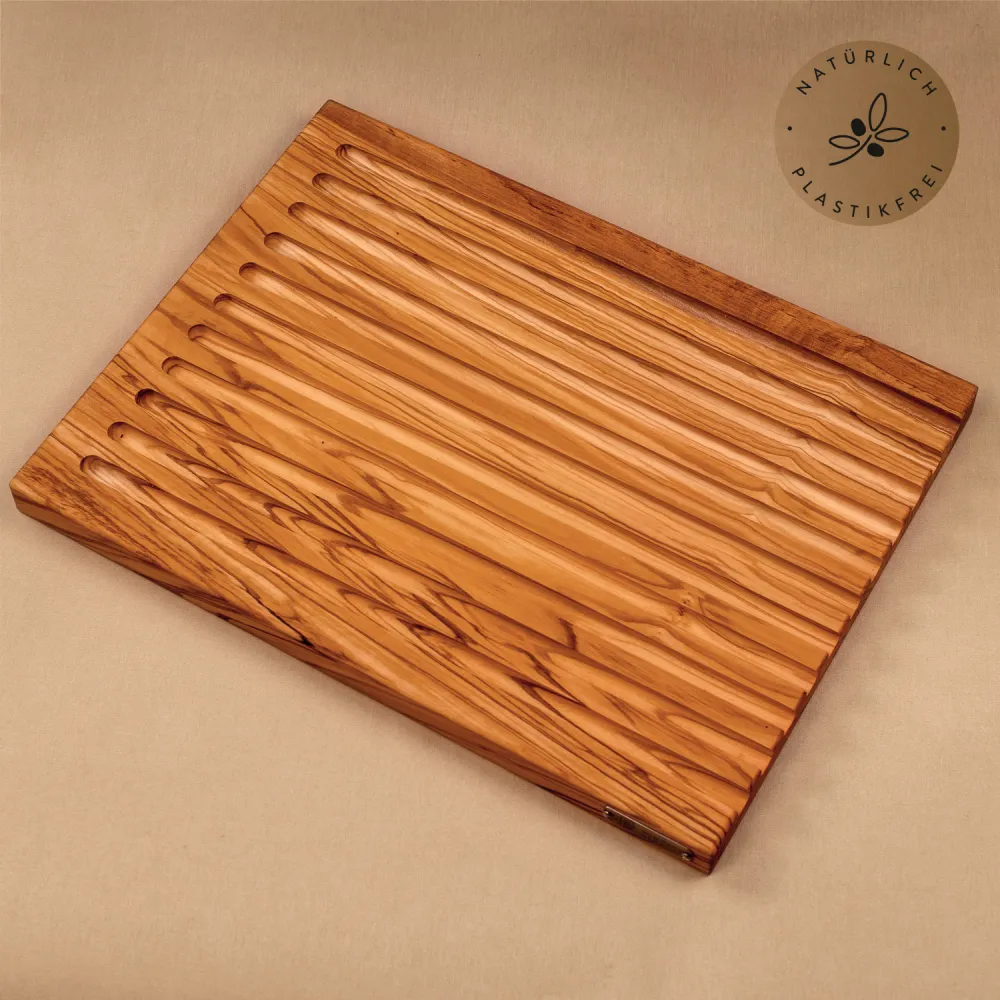 Brotschneidebrett mit Rillen aus Olivenholz | massiv & handgefertigt
